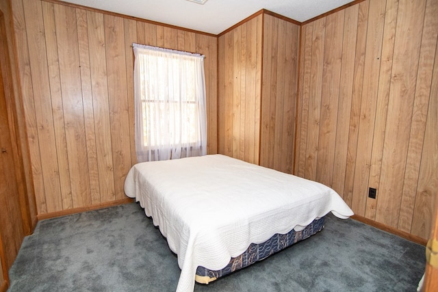 22170 Barnes Cir, Parksley, VA 23421 - carpeted bedroom featuring wooden walls, baseboards, and ornamental molding