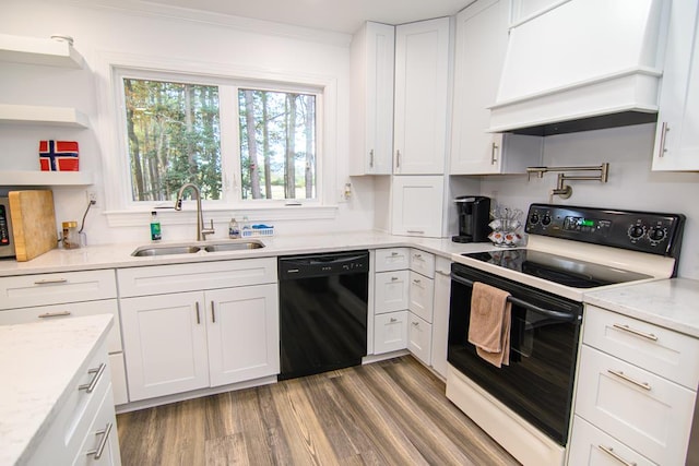 22170 Barnes Cir, Parksley, VA 23421 - kitchen featuring range with electric stovetop, dishwasher, custom exhaust hood, a sink, and white cabinets
