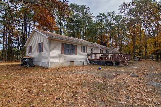 22170 Barnes Cir, Parksley, VA 23421 - view of front of property featuring a deck, crawl space, and view of scattered trees