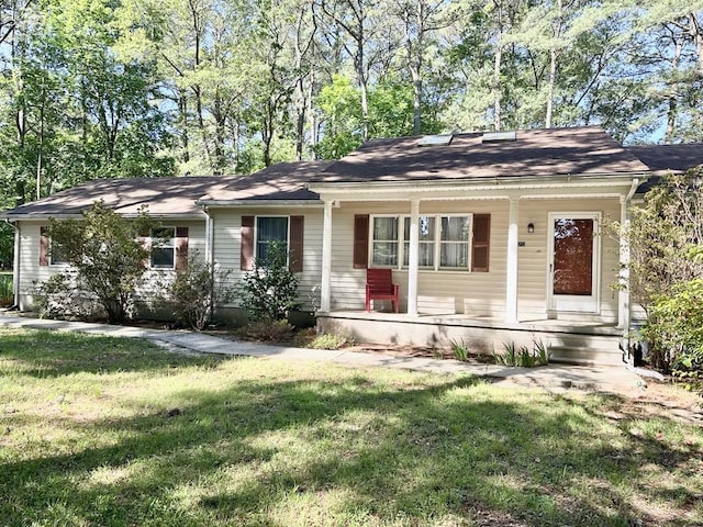 22170 Barnes Cir, Parksley, VA 23421 - single story home featuring a porch and a front lawn