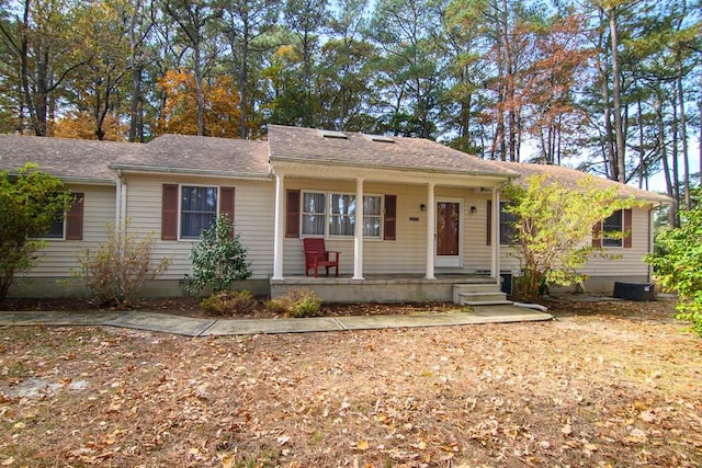 22170 Barnes Cir, Parksley, VA 23421 - ranch-style house with covered porch and roof with shingles