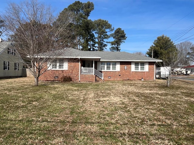 single story home featuring roof with shingles, brick siding, crawl space, and a front yard