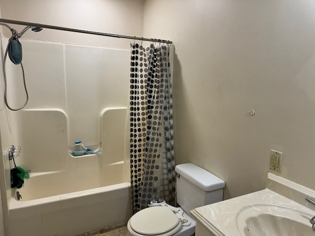 full bathroom featuring shower / bath combination with curtain, vanity, and toilet