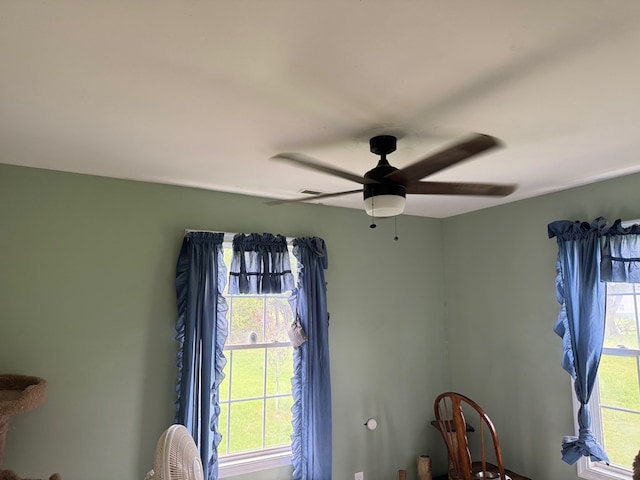 interior details featuring ceiling fan