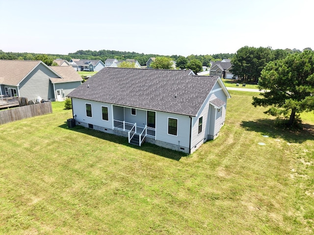 27212 Castle Row, Cape Charles, VA 23310 - back of property featuring roof with shingles, crawl space, and a residential view