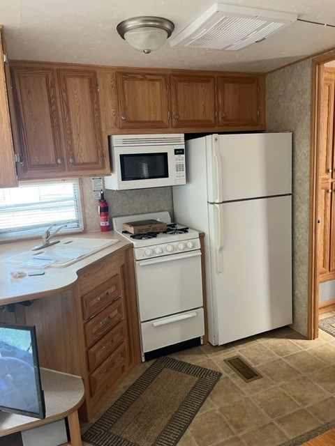 kitchen with white appliances