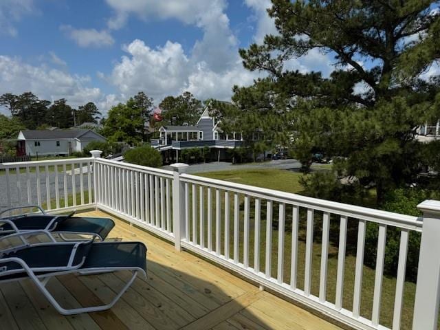 5061 Bay Colony Ln, Chincoteague, VA 23336 - wooden terrace featuring a residential view