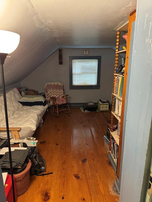 22338 Accomac Rd, Accomac, VA 23301 - bedroom featuring vaulted ceiling and wood-type flooring