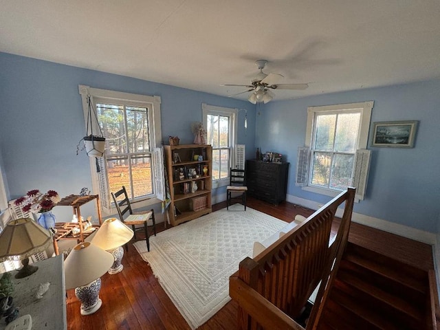 interior space featuring dark hardwood / wood-style flooring and ceiling fan