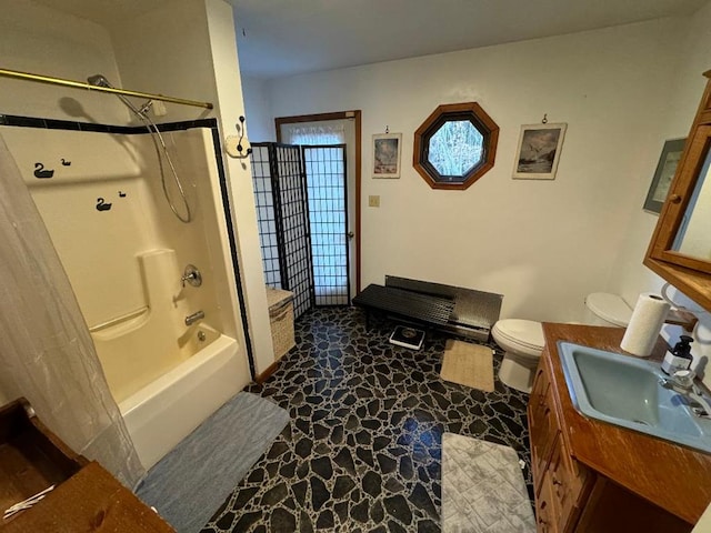 full bathroom with vanity, shower / bathtub combination, and toilet