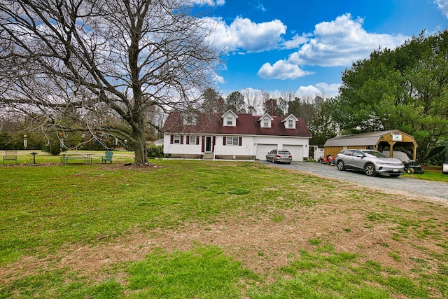 13091 Bethel Church Rd, Hallwood, VA 23359 - view of front facade featuring driveway, a front lawn, and an attached garage