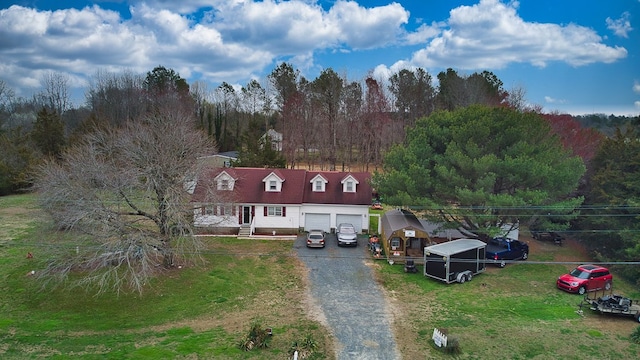 13091 Bethel Church Rd, Hallwood, VA 23359 - new england style home featuring asphalt driveway, a front lawn, and an attached garage