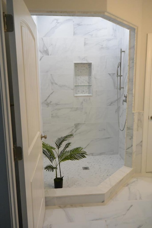 bathroom with a shower