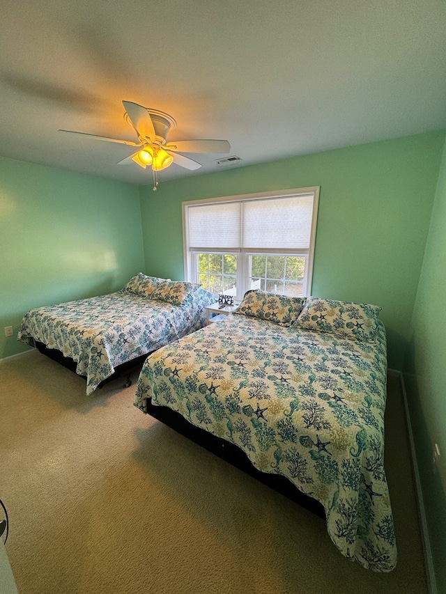 bedroom with carpet floors and ceiling fan