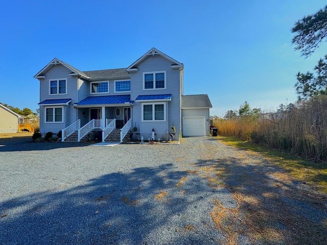 view of front of house with a porch and a garage