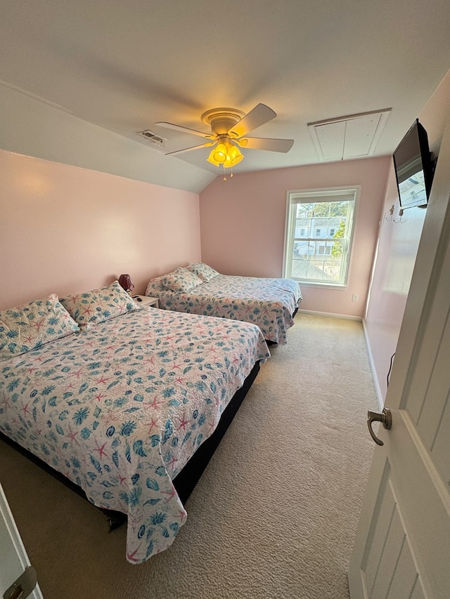 bedroom with vaulted ceiling, light carpet, and ceiling fan