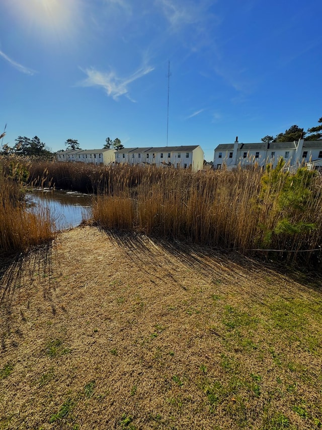 view of yard featuring a water view