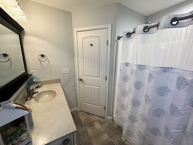 bathroom with vanity and a shower with curtain