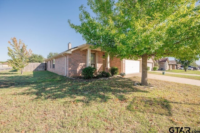 11017 Westhaven Cir, Flint, TX 75762 - view of front of property with brick siding, a chimney, concrete driveway, and an attached garage