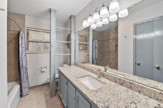 full bathroom with vanity, tile patterned floors, toilet, a textured ceiling, and shower / tub combo with curtain