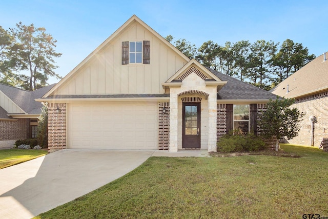 view of front facade with a garage and a front lawn