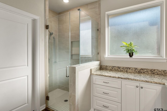 bathroom with walk in shower