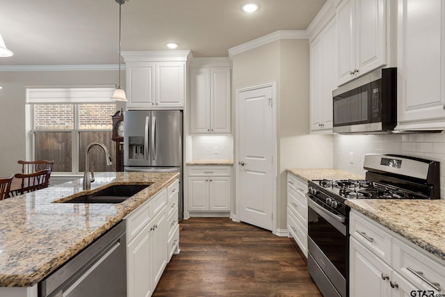 kitchen with white cabinetry, appliances with stainless steel finishes, and sink