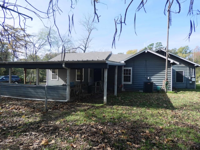 view of property exterior featuring cooling unit and a yard