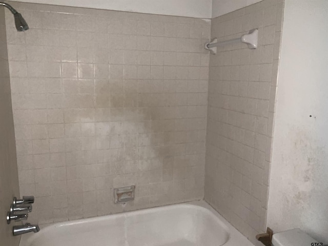8307 Garrett Dr, Tyler, TX 75703 - full bathroom featuring bathtub / shower combination and toilet