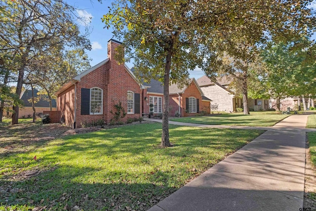 view of front of house with a front lawn