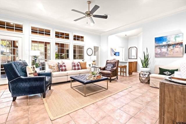 tiled living room featuring ornamental molding and ceiling fan