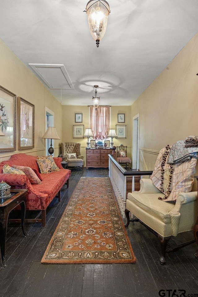 502 E Montgomery St, Crockett, TX 75835 - living area featuring attic access and hardwood / wood-style floors