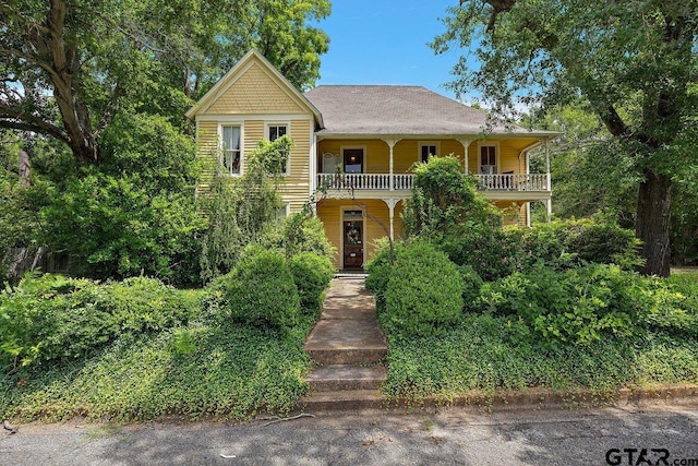 502 E Montgomery St, Crockett, TX 75835 - victorian-style house with covered porch