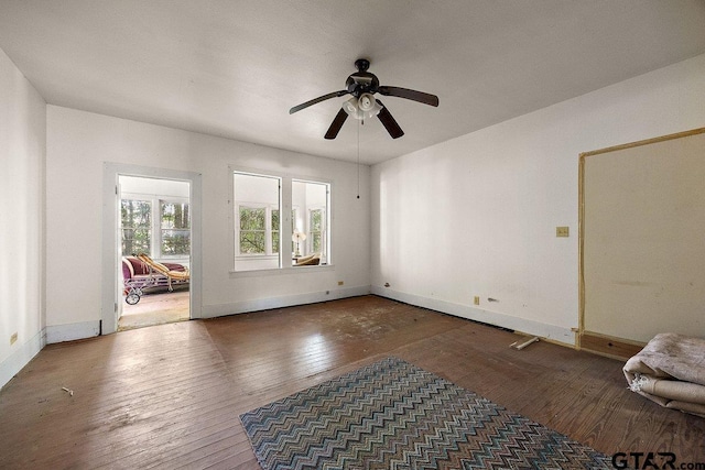 502 E Montgomery St, Crockett, TX 75835 - unfurnished living room with ceiling fan and hardwood / wood-style flooring