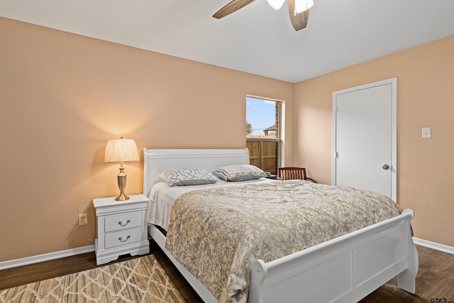 553 Princess Pl, Tyler, TX 75704 - bedroom with dark wood-style flooring, baseboards, and a ceiling fan
