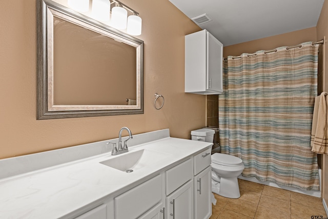 553 Princess Pl, Tyler, TX 75704 - bathroom featuring toilet, tile patterned floors, vanity, and visible vents