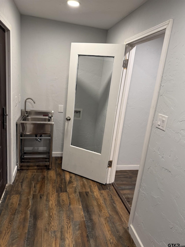 bathroom featuring hardwood / wood-style floors and sink