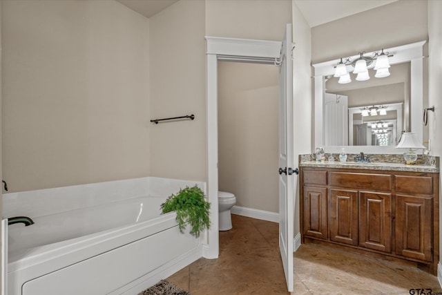 bathroom featuring vanity, toilet, and a bathtub