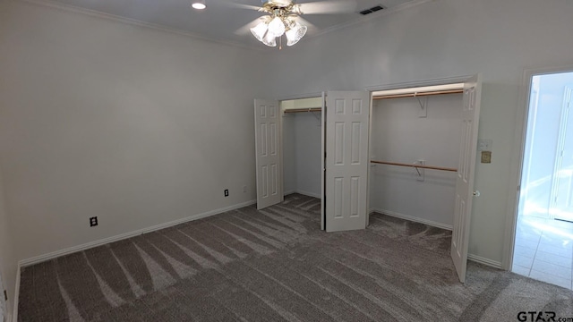 1173 Garden Park Cir, Tyler, TX 75703 - unfurnished bedroom featuring carpet flooring, baseboards, multiple closets, ornamental molding, and recessed lighting