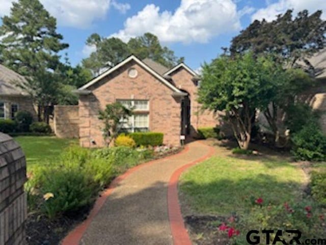 1173 Garden Park Cir, Tyler, TX 75703 - view of front of home featuring a front yard
