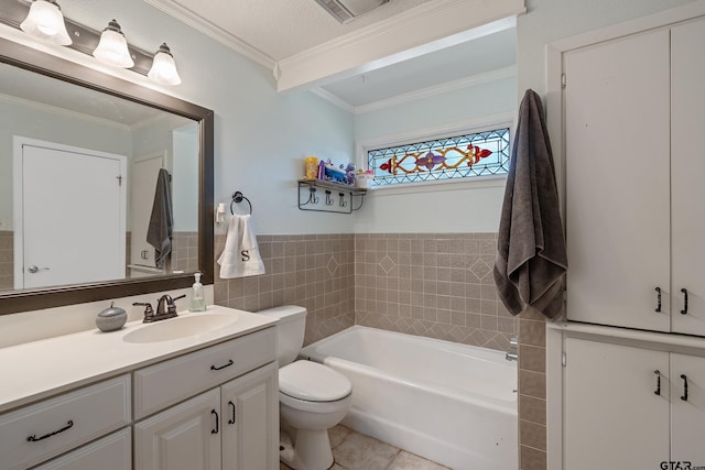 bathroom featuring tile walls, crown molding, vanity, tile patterned flooring, and toilet