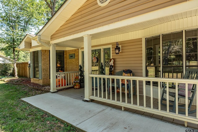 doorway to property featuring covered porch