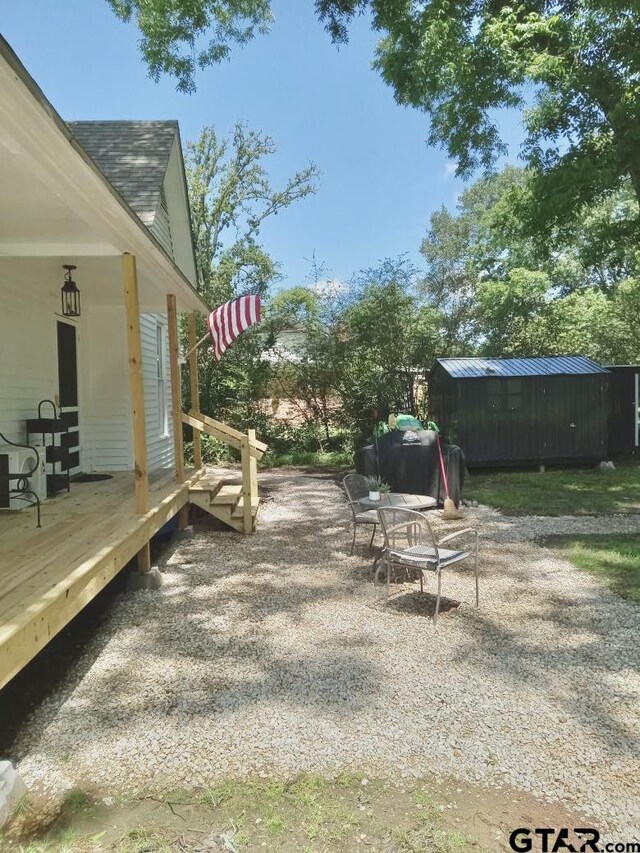 138 S Grace St, Crockett, TX 75835 - view of yard featuring a wooden deck