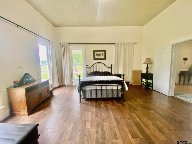 138 S Grace St, Crockett, TX 75835 - bedroom featuring wood finished floors and access to outside