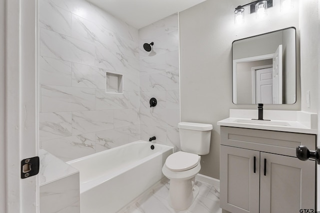 full bathroom featuring vanity, toilet, and tiled shower / bath combo