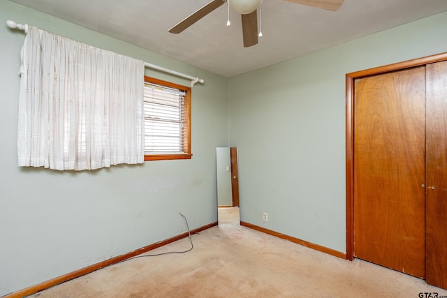311 S Houston St, Bullard, TX 75757 - unfurnished bedroom featuring ceiling fan, light colored carpet, and a closet