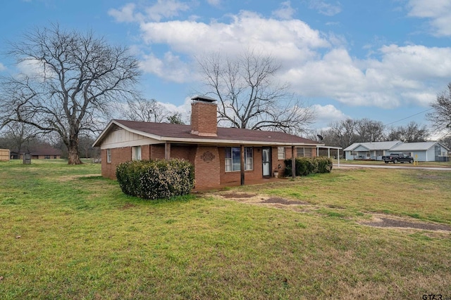 311 S Houston St, Bullard, TX 75757 - back of house with a lawn