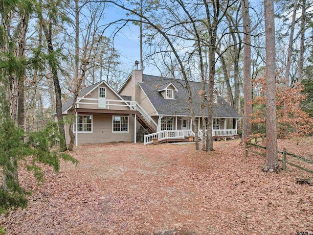 view of front of house with a wooden deck