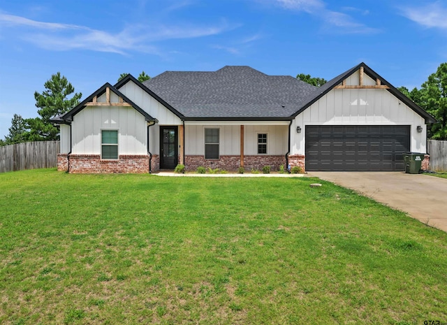 modern farmhouse style home featuring a garage and a front lawn