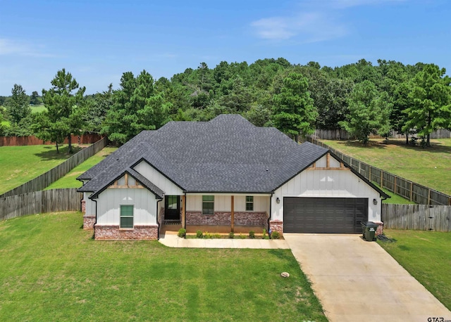 modern farmhouse style home featuring a garage and a front yard